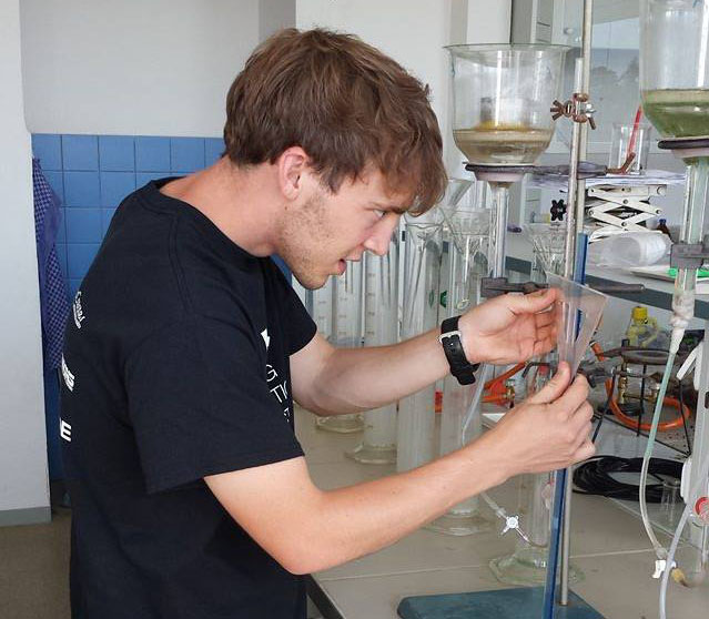 Person work on lab equipment